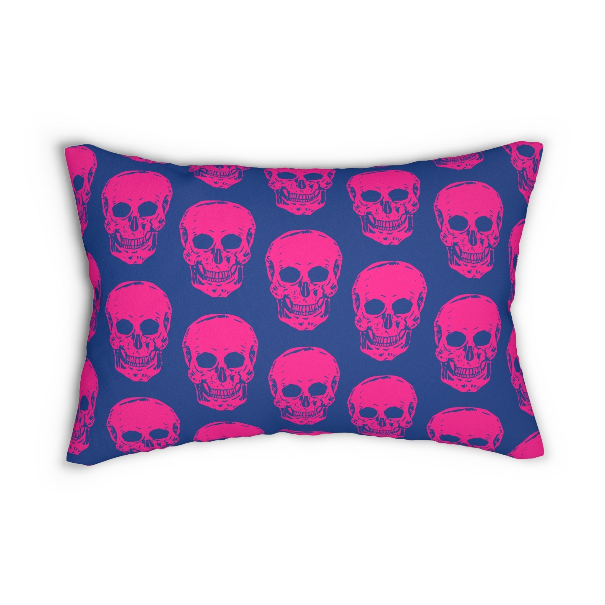 Vibrant neon pink skull print lumbar pillow on deep blue background.