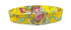 Bright yellow floral D-ring belt with pink, blue, and green print.