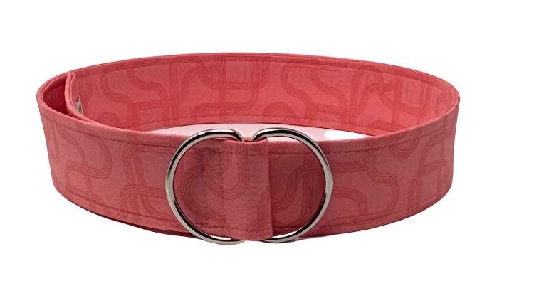 Melon and pink wide D-ring belt with geometric pattern, 2-inch wide.